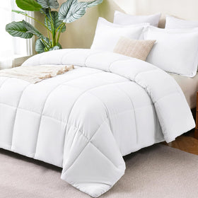 CozyLux Queen comforter fabric close-up showing softness and warmth.