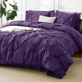 CozyLux queen comforter purple pintuck close-up showing elegant texture and cozy warmth.