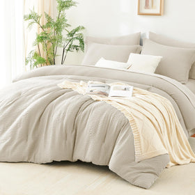 CozyLux queen comforter set in beige seersucker stripes enhances a calm, stylish bedroom for year-round comfort.