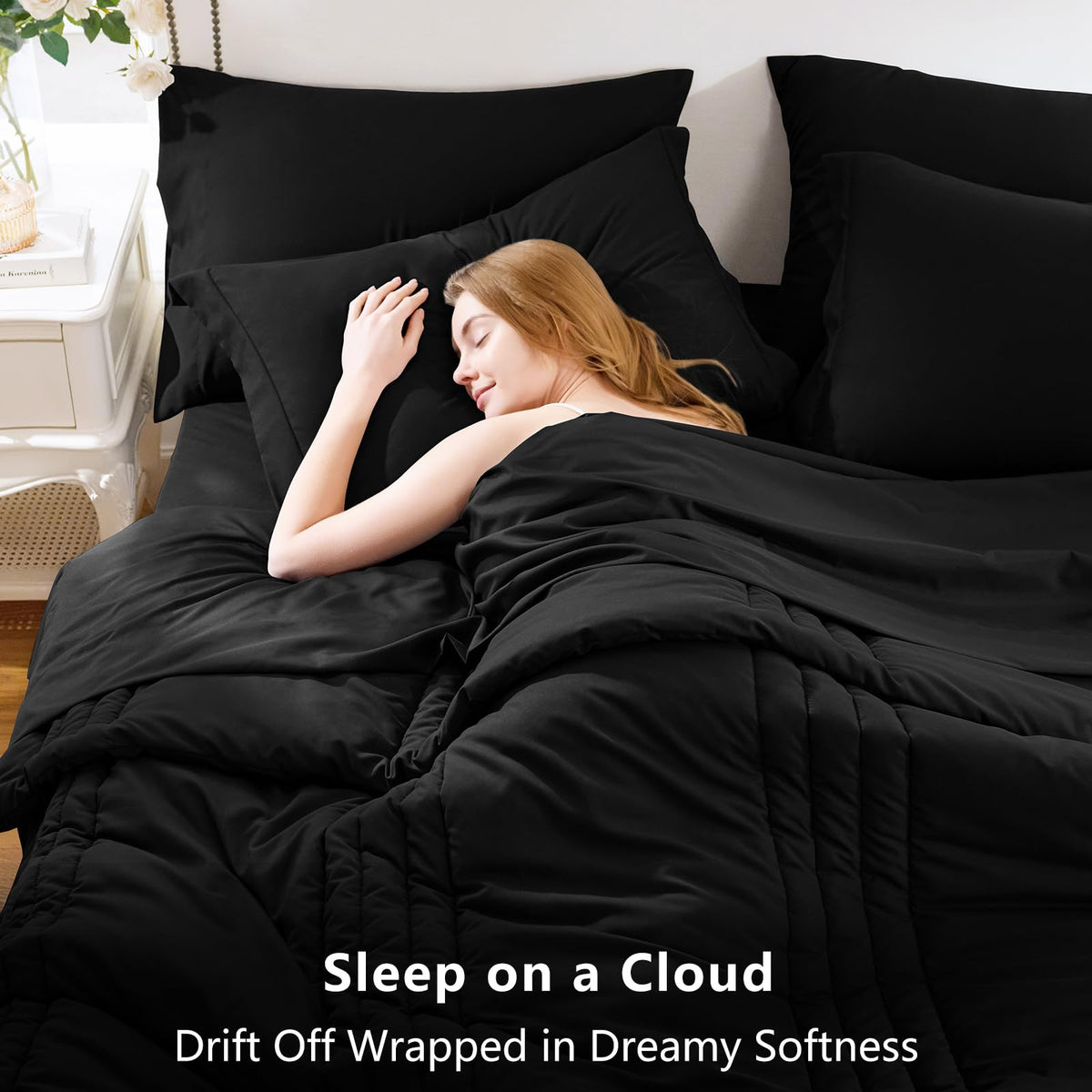 CozyLux comforter close-up detail emphasizes soft microfiber fabric for year-round comfort