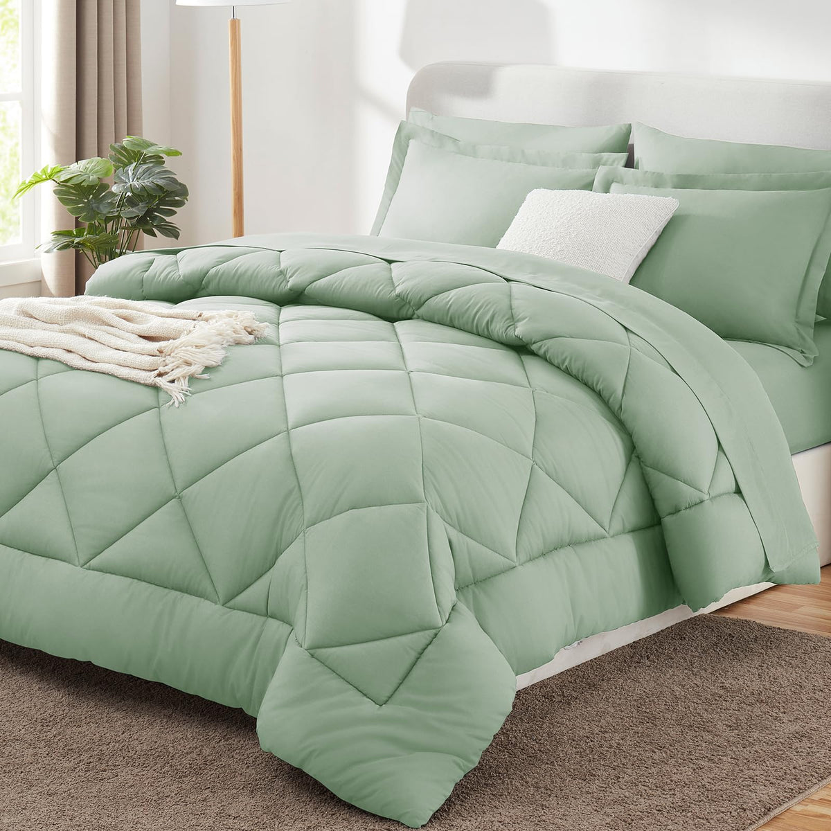 CozyLux queen comforter set sage green on bed, highlighting all-season softness