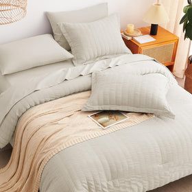 CozyLux microfiber softness conveys lightweight warmth for year-round comfort