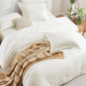 CozyLux ivory seersucker weave adds subtle texture to bedding