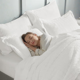 CozyLux seersucker wrinkle-look close-up reinforces modern textured appeal.