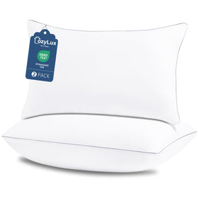 CozyLux soft-supportive pillows on bed offering all-night comfort and alignment