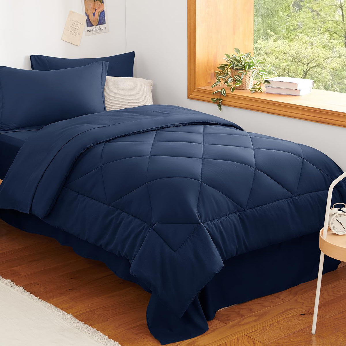 CozyLux Twin XL Comforter Set Navy Blue on bed for dorm room comfort