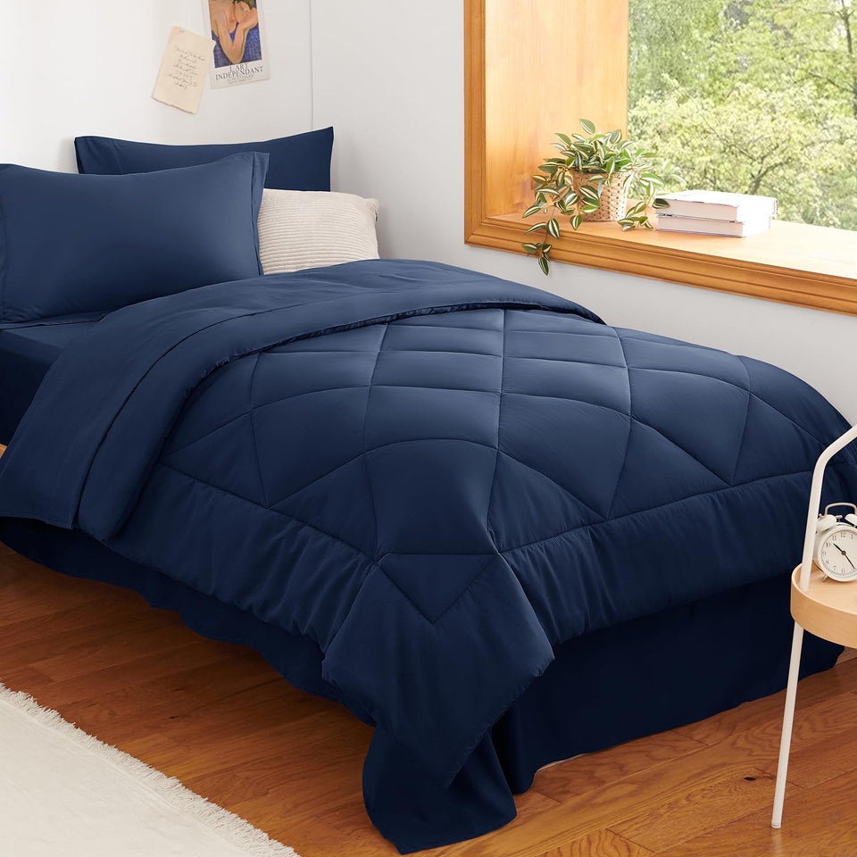 CozyLux Twin XL Comforter Set Navy Blue on bed for dorm room comfort