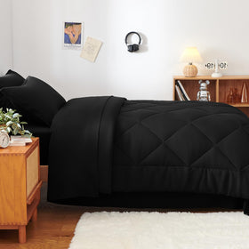 Dorm room setup with CozyLux Twin XL starter kit for college comfort.