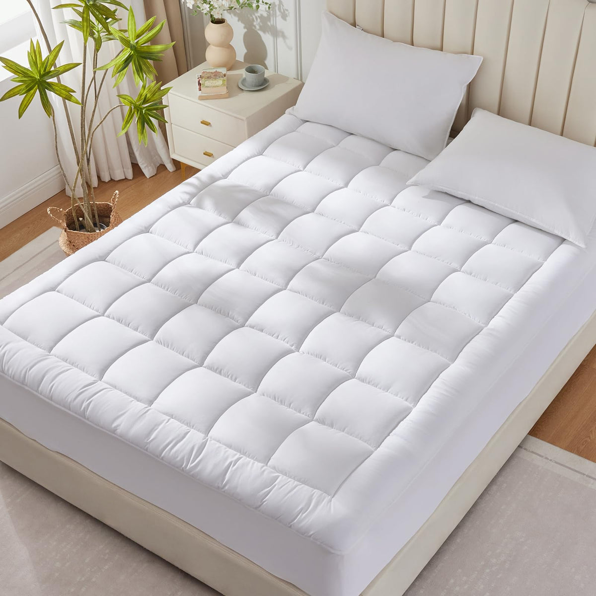 CozyLux white mattress protector on a neatly made bed, illustrating easy care routine.