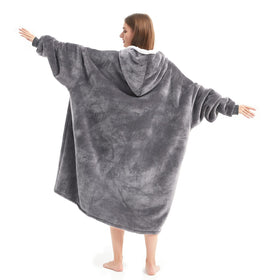 Cozystar oversized sleeves hoodie blanket enables relaxed lounging.