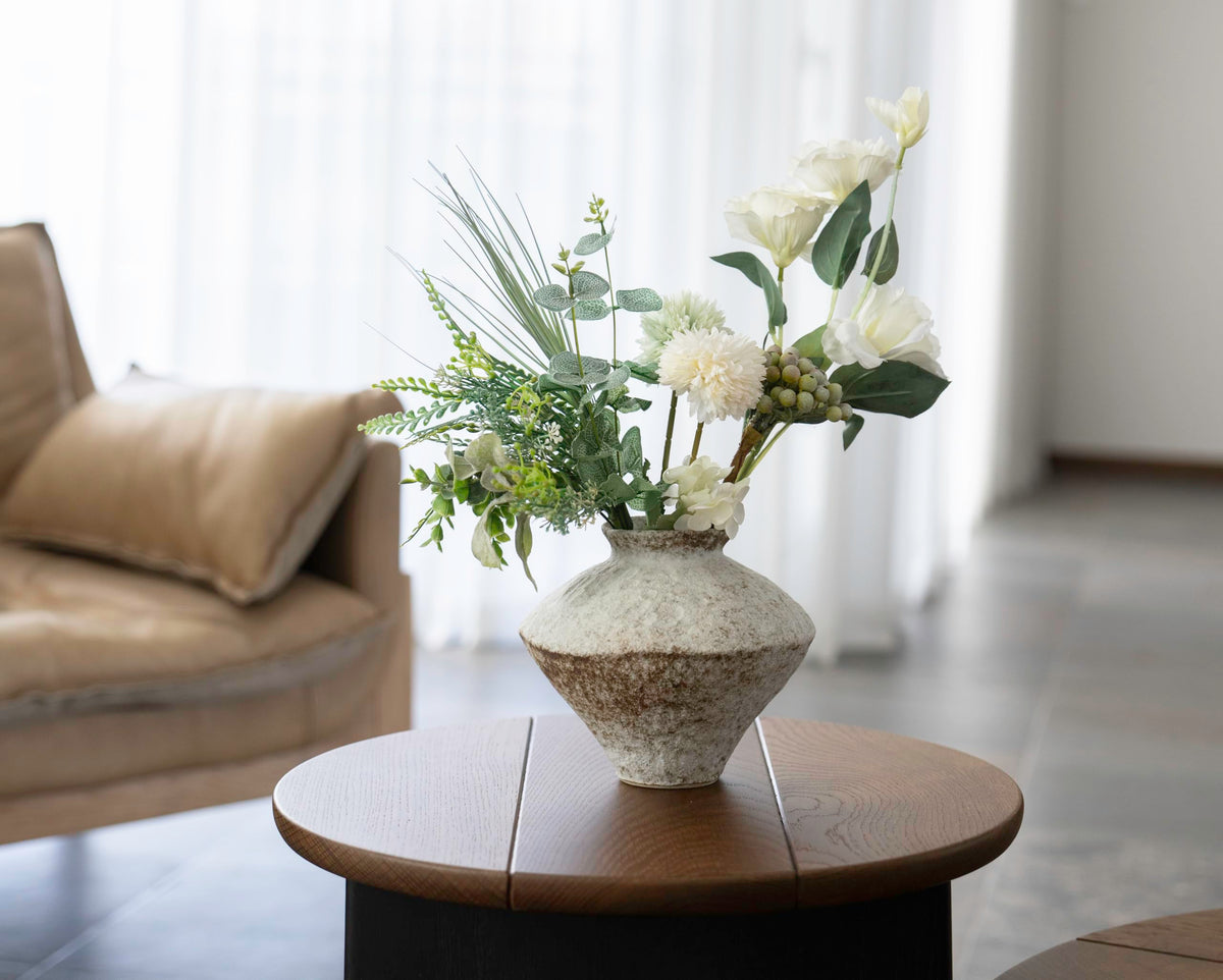 CozyWel vase enhances living room decor with natural charm and texture.