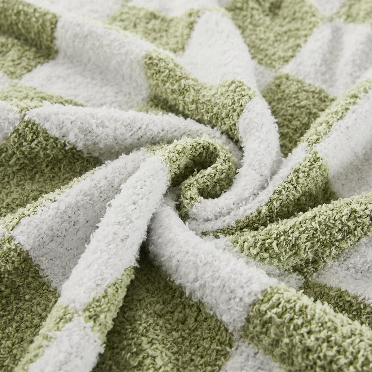 Cozzenity sage green checkered throw used for a picnic with light warmth