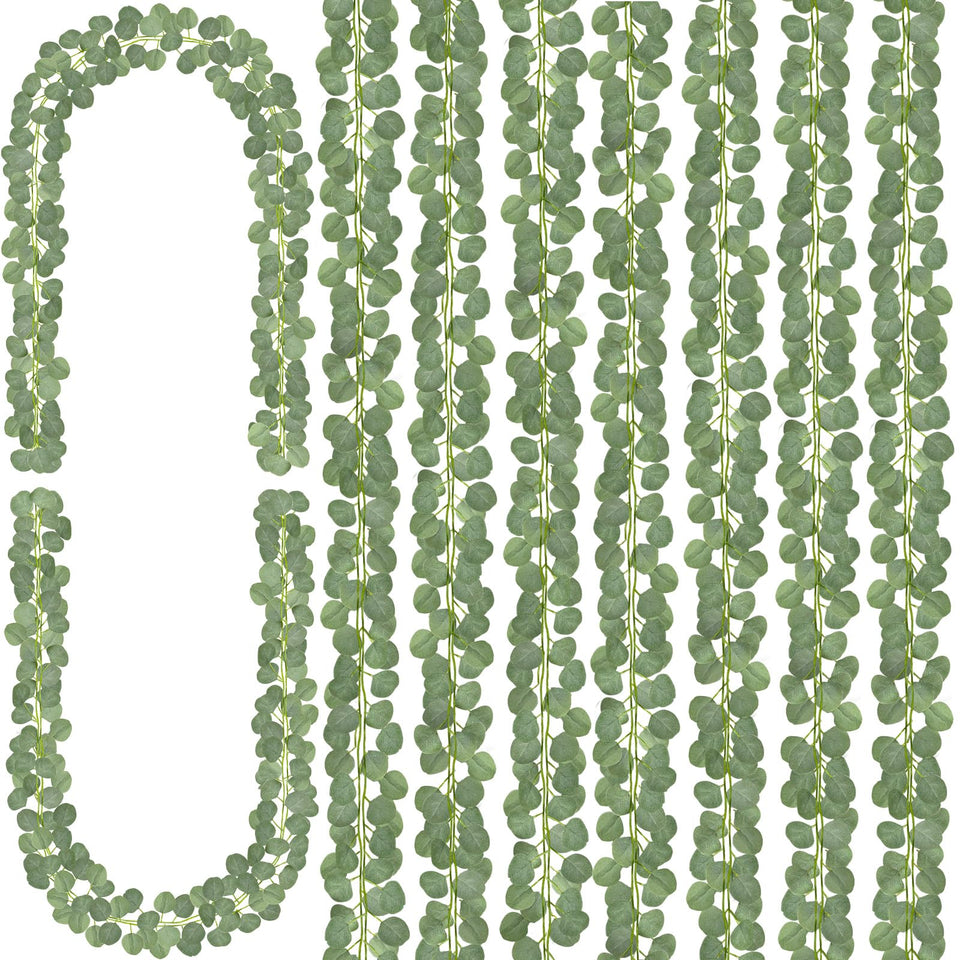CQURE eucalyptus garland draped on a table for elegant wedding ambiance.