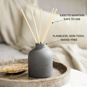 Craft & Kin diffuser displayed in a living room with woody vanilla notes.