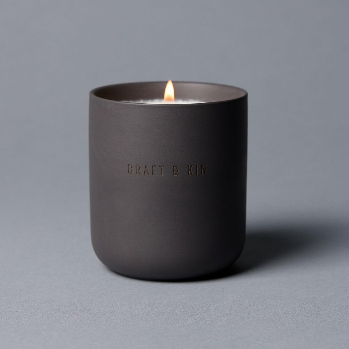 Living room setup with Craft & Kin Santal Woods candle for relaxation