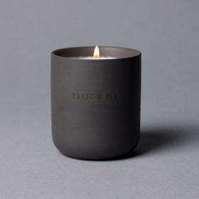 Living room setup with Craft & Kin Santal Woods candle for relaxation