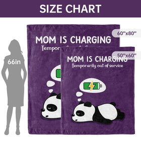 Craftique Mom blanket draped over sofa shows lightweight warmth for lounging