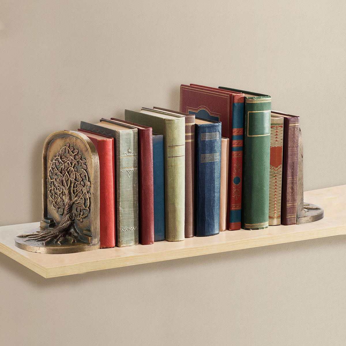Craftsman Road Tree of Life bookends provide sturdy shelf support