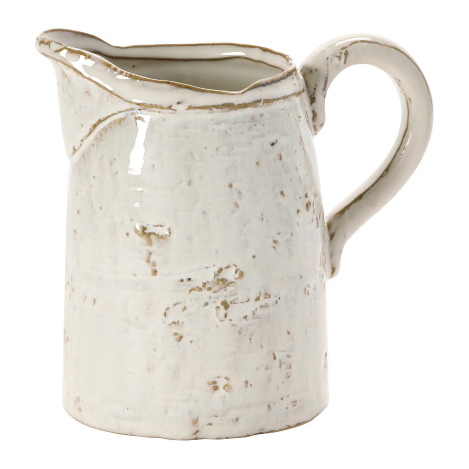 Creative Co-Op 28 oz stoneware pitcher with reactive glaze—one-of-a-kind look.