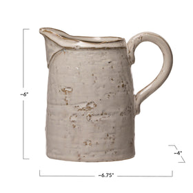 Creative Co-Op stoneware pitcher ideal for serving beverages in style.