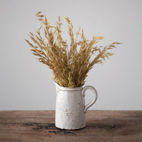 Creative Co-Op 28 oz pitcher with sturdy handle for easy pouring.