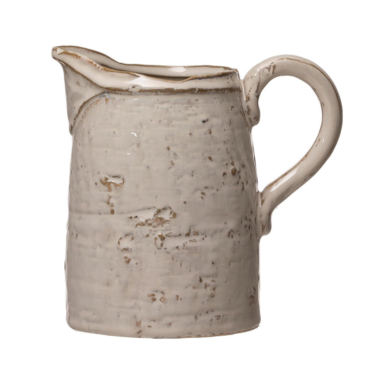 Creative Co-Op pitcher shows naturally varying finish, adding table character.