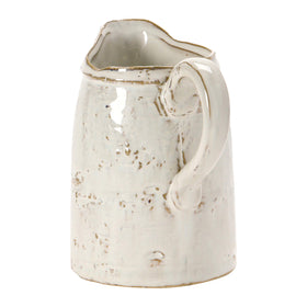Creative Co-Op white glaze pitcher adds charm to casual gatherings.