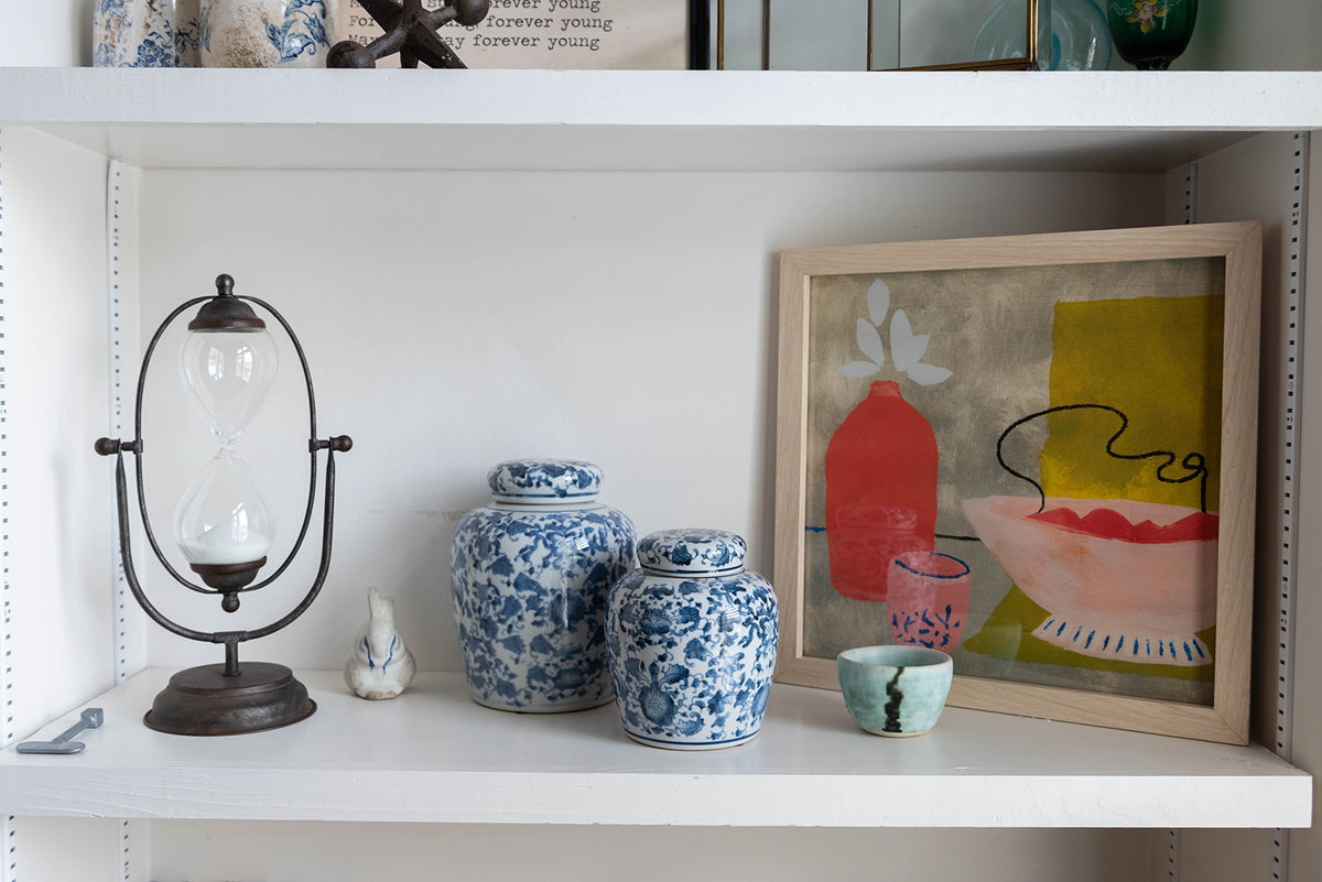 Creative Co-Op ginger jar displayed on shelf adds a soothing accent.