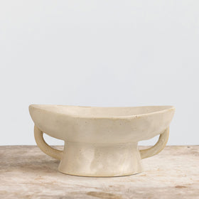 Creative Co-Op bowl on a shelf elevating decorative elements