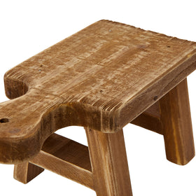Creative Co-Op carved wood pedestal displays figurines and keepsakes