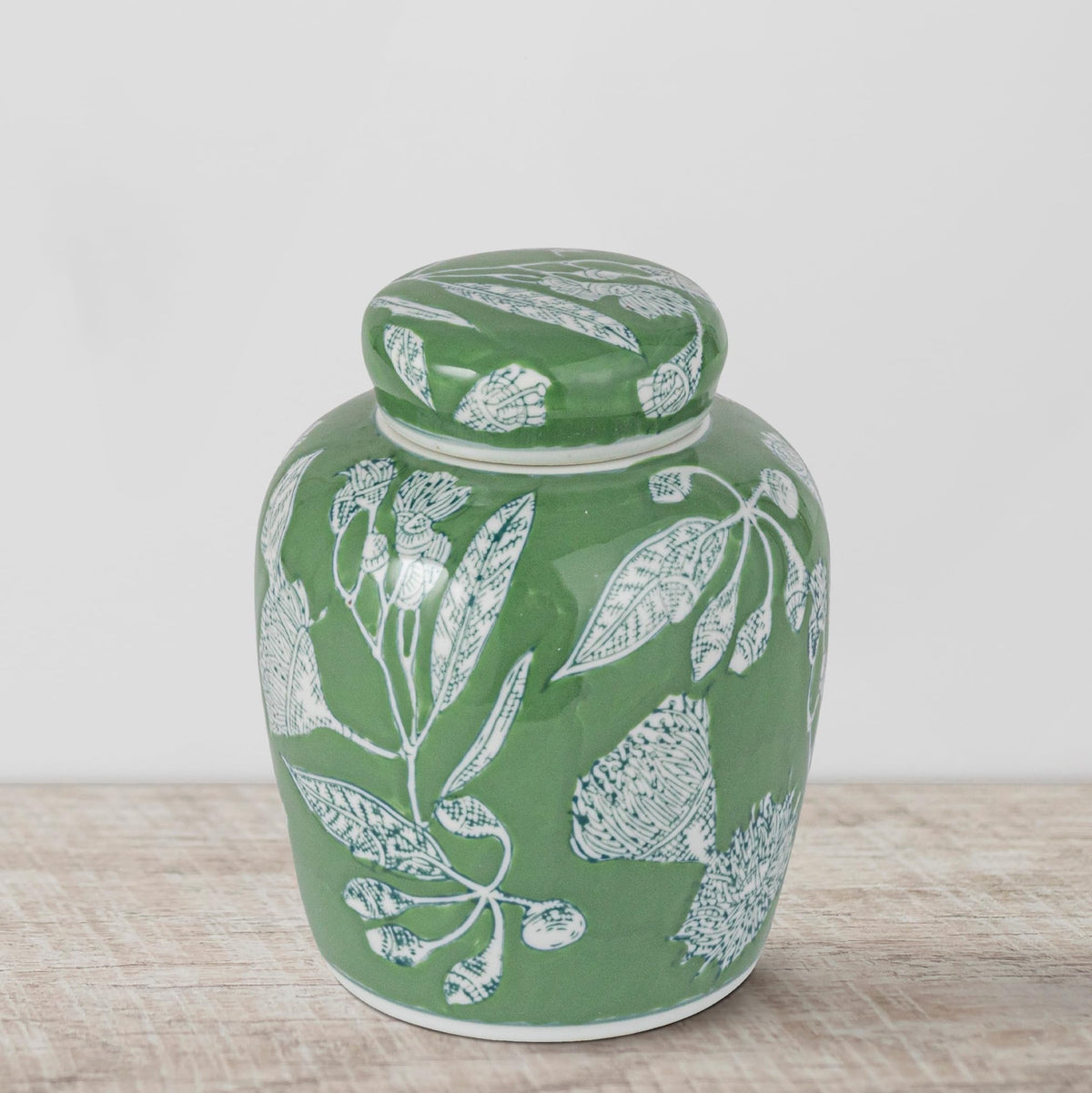 Creative Co-Op ginger jar complements Asian-inspired interiors with soothing vibes.