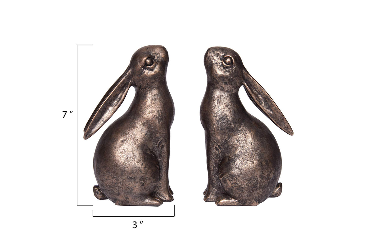 Creative Co-Op bronze rabbit bookend pair on shelf supports varying book sizes with whimsy.