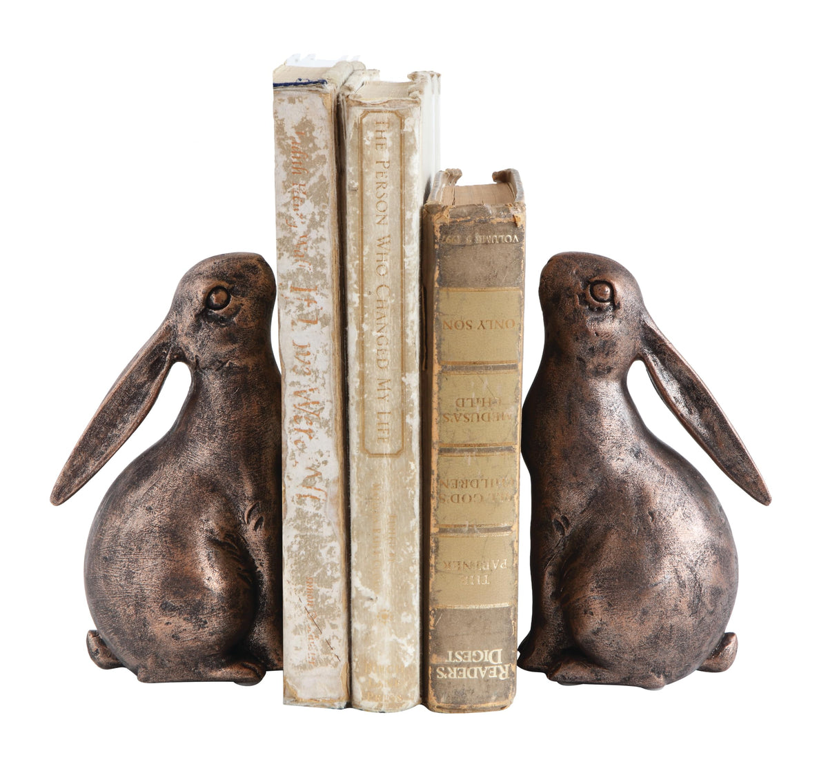 Creative Co-Op rabbit bookends bronze décor on living room shelf with rustic flair.