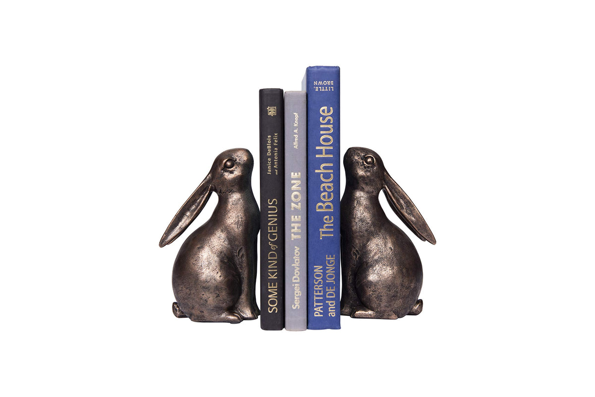 Creative Co-Op rabbit bookends in nursery setup with soft bronze finish.