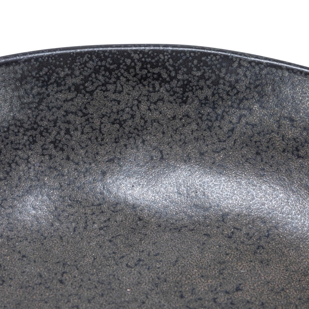 Stoneware bowl with sculptural base for dried botanicals.