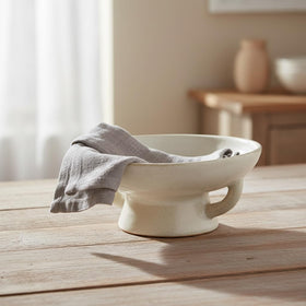 Creative Co-Op stoneware bowl filled with fruit, showcasing practical kitchen display.