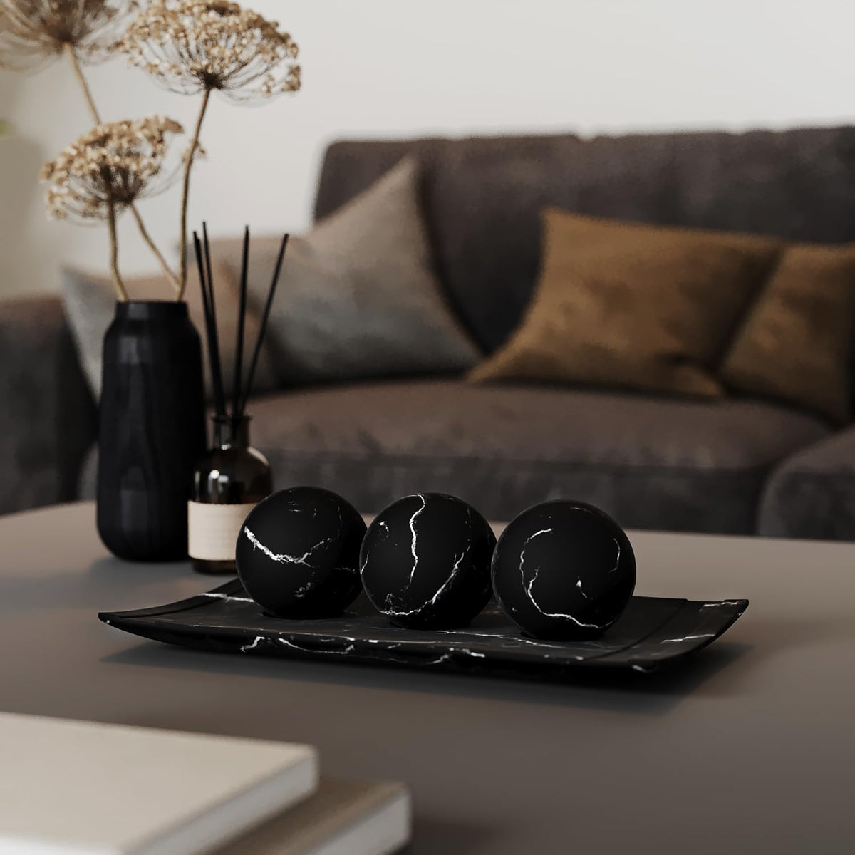 Creative Scents Black Marble Orb Set adds dimension to the display.