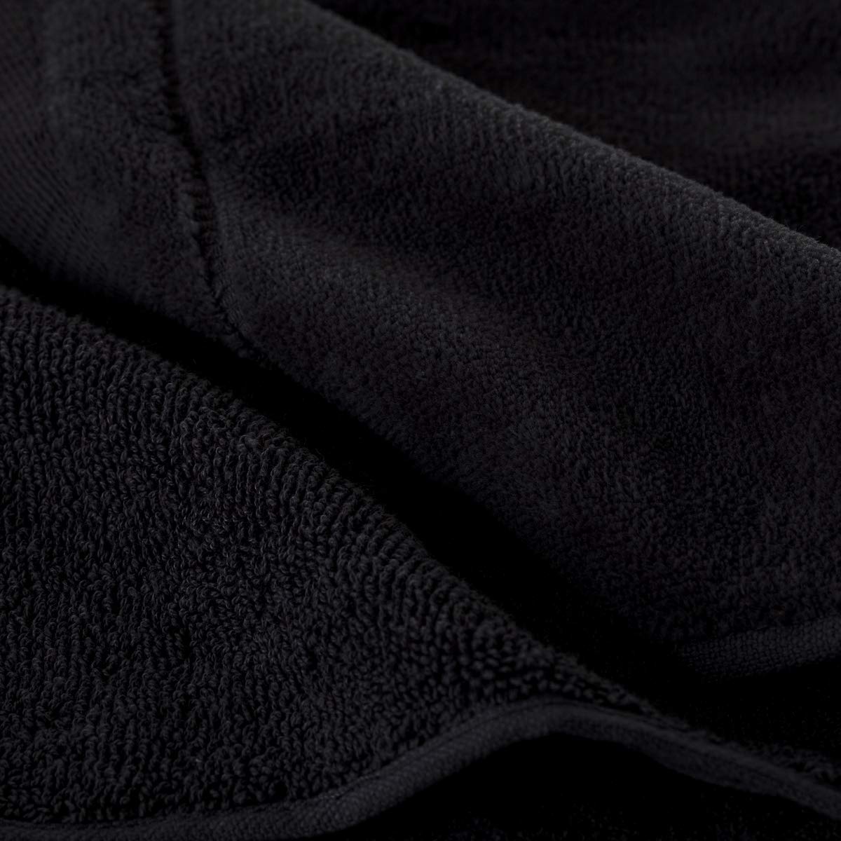 Creative Scents black towels elevate decor in powder rooms and guest baths.