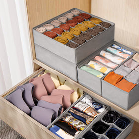 Criusia 4x6-cell bins for scarves, belts, and baby clothes keep categories easy.