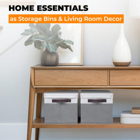 Criusia closet storage bin neatly fits towels and clothes on a shelf.