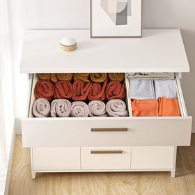 Criusia beige 12-pack in a dresser drawer maximizes space.