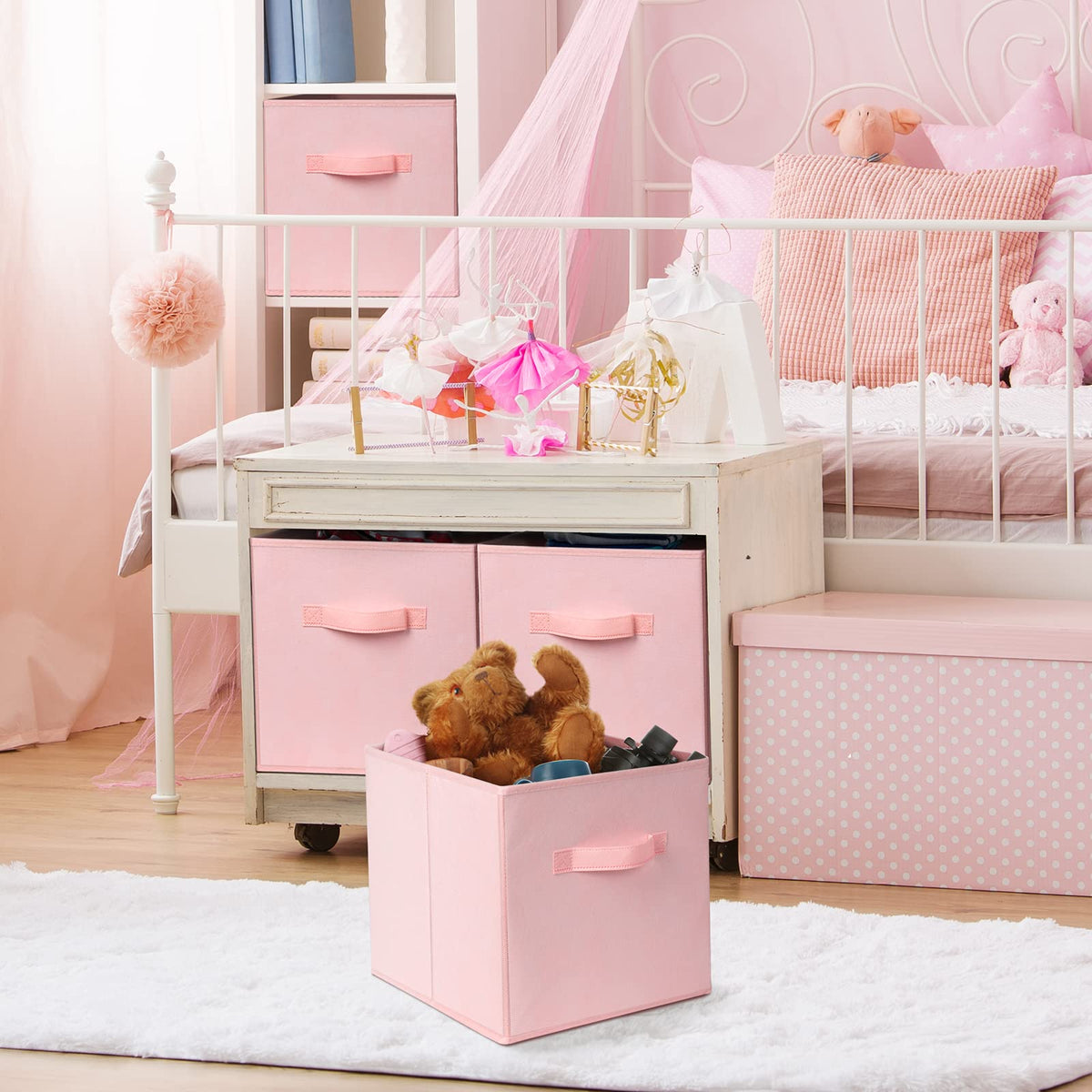 Criusia pink storage cubes on a shelf in a neat closet