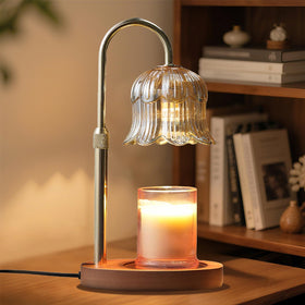 CRMILL candle warmer enhances bedside warmth for a relaxing nightstand setup.
