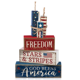 CroBlissful 4th of July décor blocks on mantel for patriotic display.