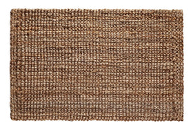 Croft&Cane handspun jute rug in warm tan adds natural texture to living spaces.