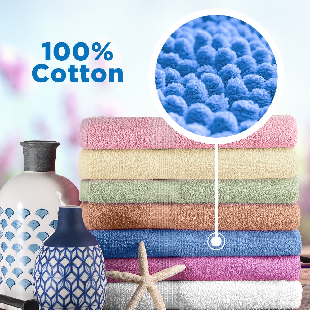 CrystalTowels towels hanging demonstrate generous 27x52 size and quick-dry potential.
