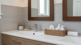 CubesLand bathroom decor set of two baskets in neutral tones.