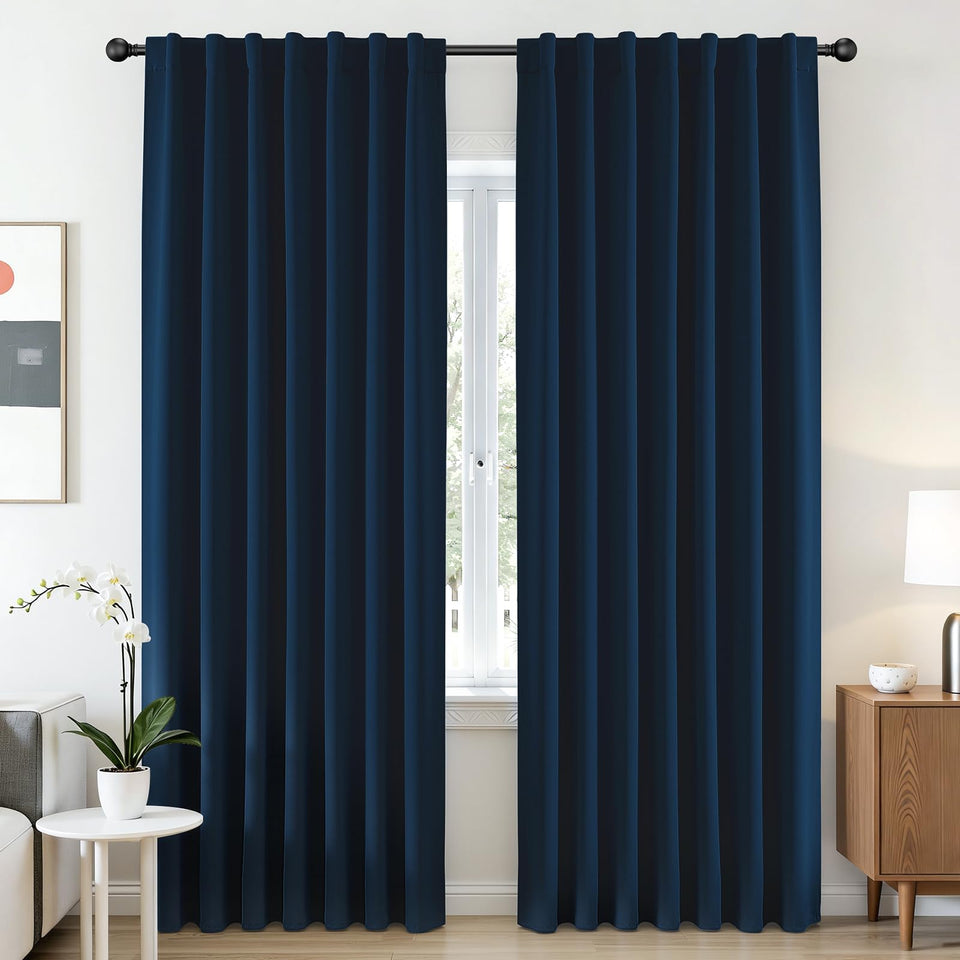 CUCRAF navy blue blackout curtains, two-panel set framing the window for privacy.