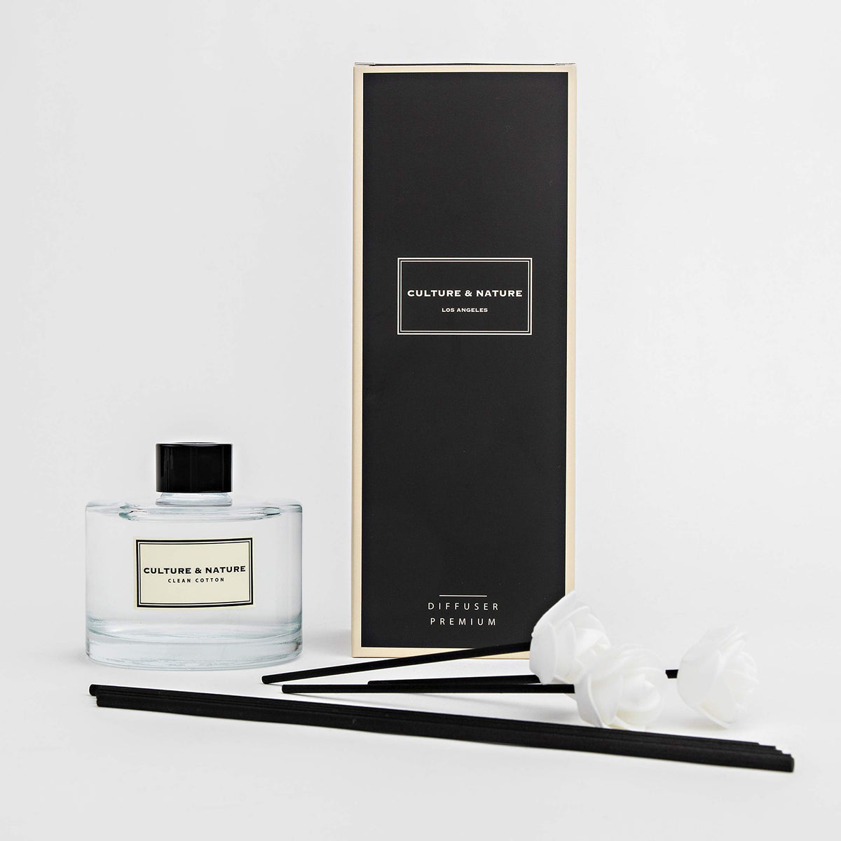 Culture & Nature reed diffuser sticks soaking to release subtle fruity floral notes
