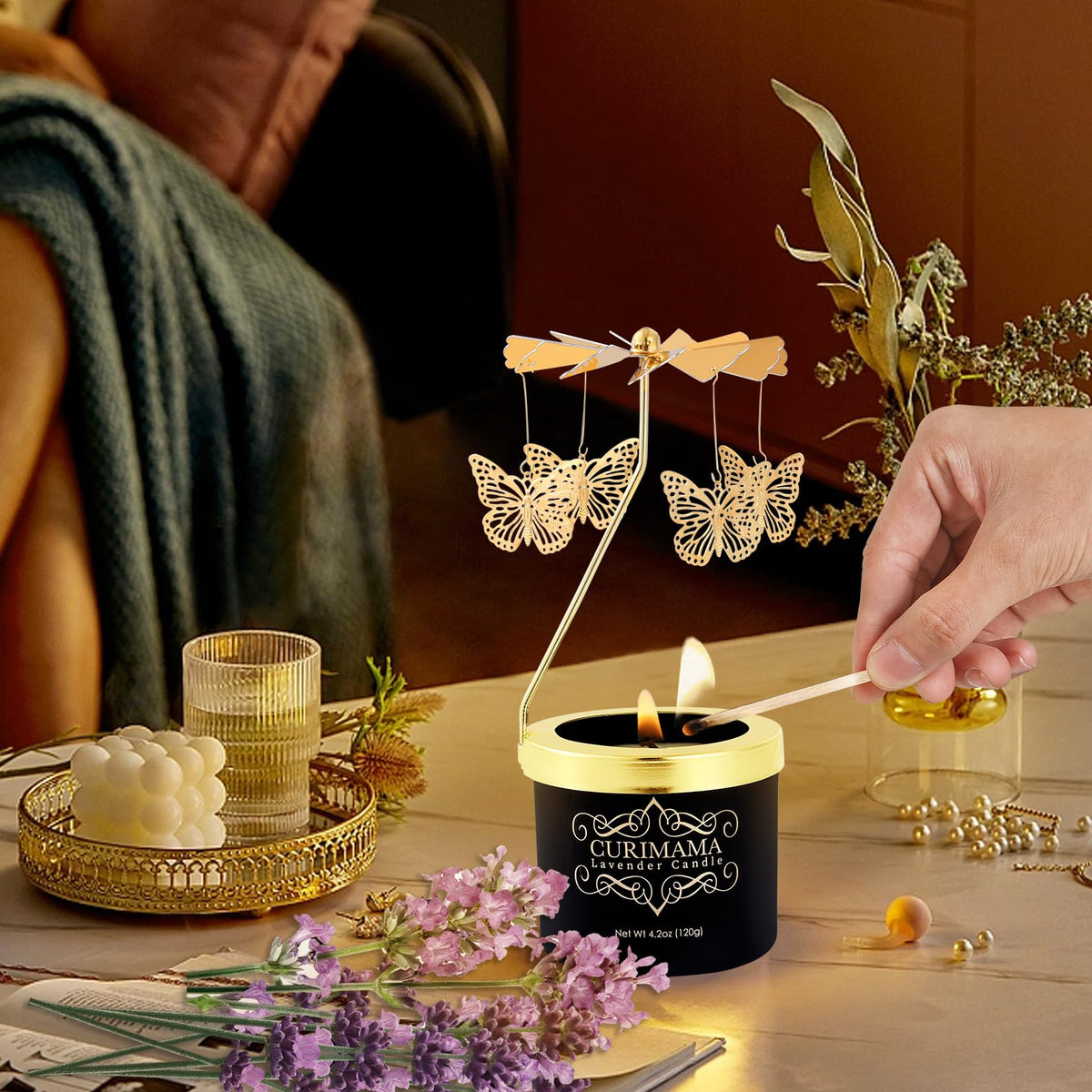 Curimama rose-scented soy candle in a glass jar adds elegant room fragrance.